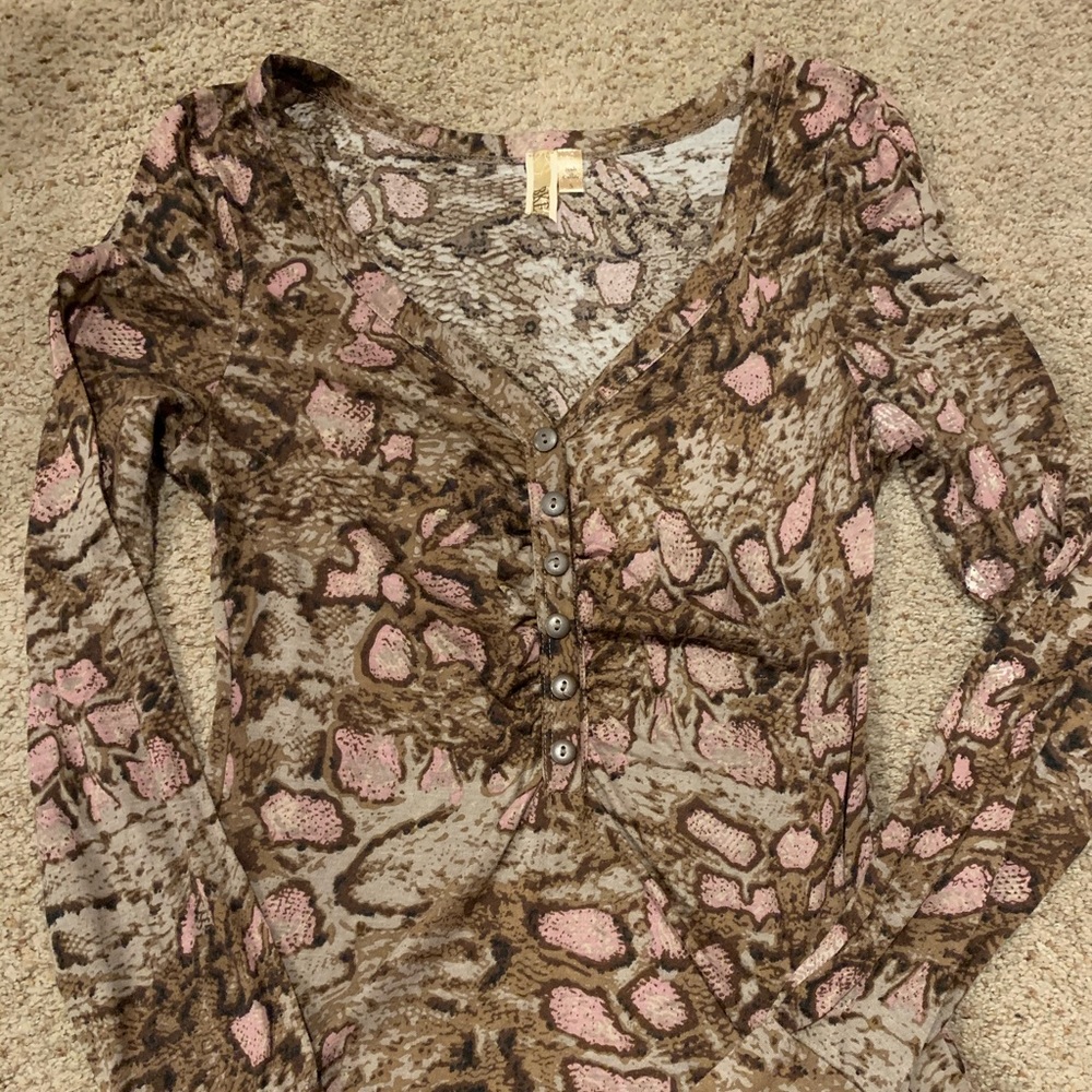 BKE from the Buckle snake print button accent top.